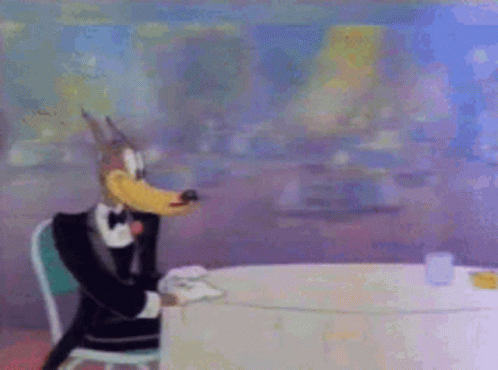 Cartoon Character in Tuxedo Sitting