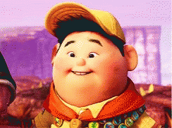 Cartoon Character in Yellow Hat and Scarf Smiling