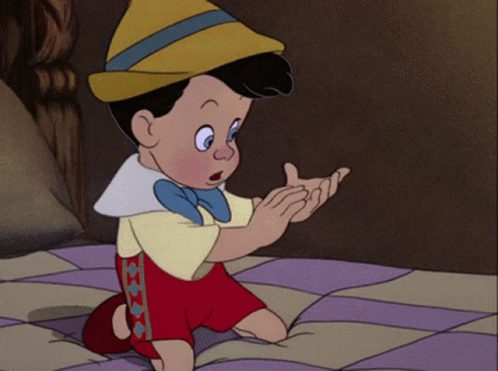 Cartoon Character Kneeling on Bed