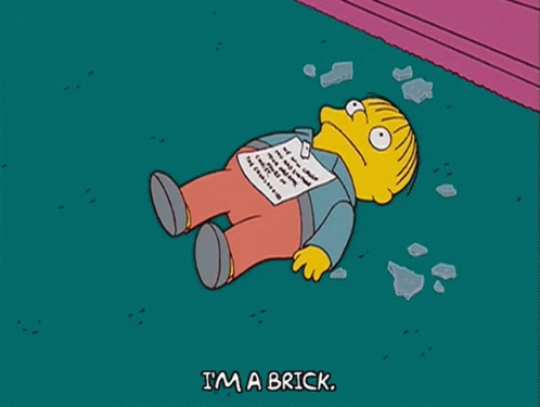 Cartoon Character Laying Down Saying I'm a Brick