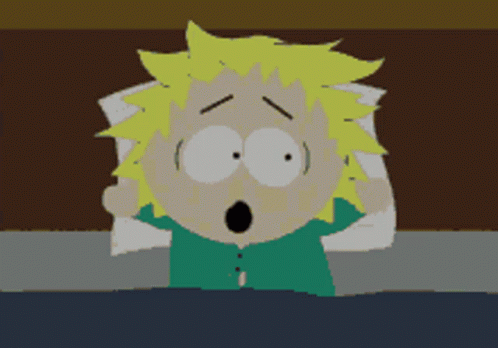 Cartoon Character Laying in Bed With Pillow on Head