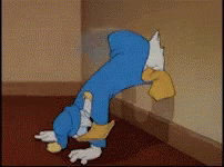 Cartoon Character Leaning Against Wall With Head in Hole