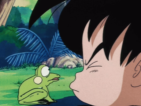 Cartoon Character Looking at Green Frog