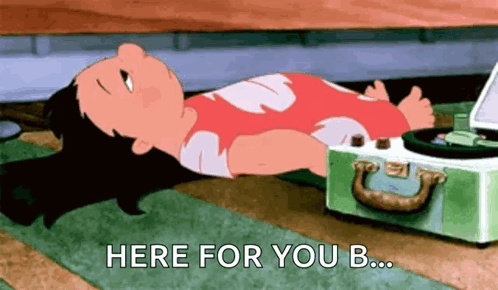 Cartoon Character Lying Beside Record Player And Suitcase GIF