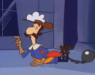 Cartoon Character Lying on Floor with Ball and Chain