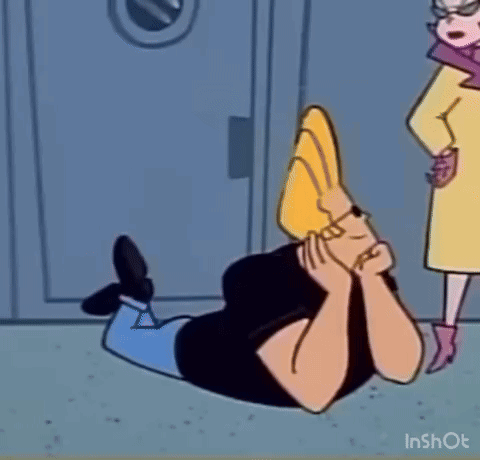 Cartoon Character Lying on Ground With Woman Standing Behind