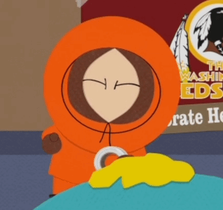 Cartoon Character Near Washington Redskins Sign