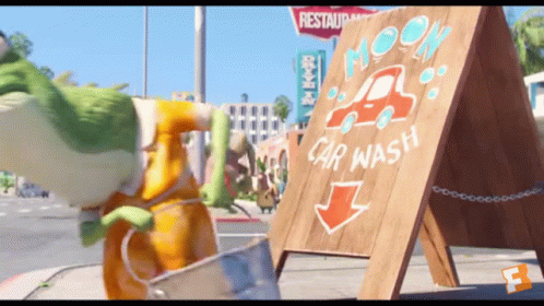 Cartoon Character Next to Moon Car Wash Sign