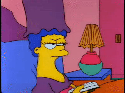 Cartoon Character on Bed With Remote and Lamp