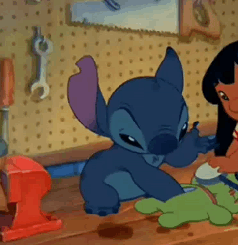 Cartoon Character on Wooden Table with Lilo and Stitch Doll