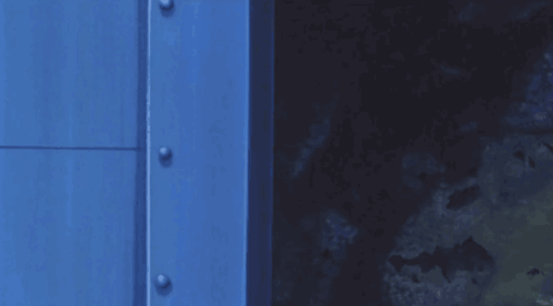 Cartoon Character Peeking Out Of Blue Door GIF