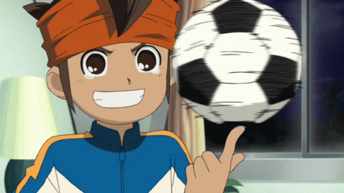 Cartoon Character Pointing At Soccer Ball GIF