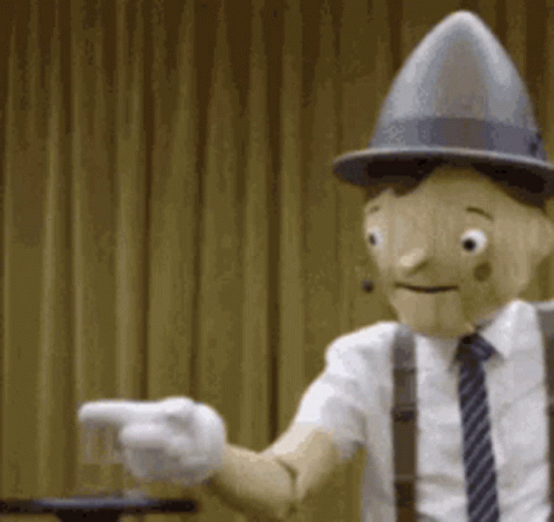 Cartoon Character Pointing with Hat and Suspenders