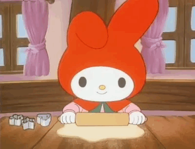 Cartoon Character Rolling Dough On Wooden Table GIF