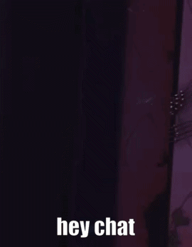 Cartoon Character Saying Hey Chat In Dark Room GIF