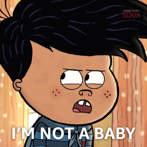 Cartoon Character Says I'm Not a Baby in Front of Wooden Wall