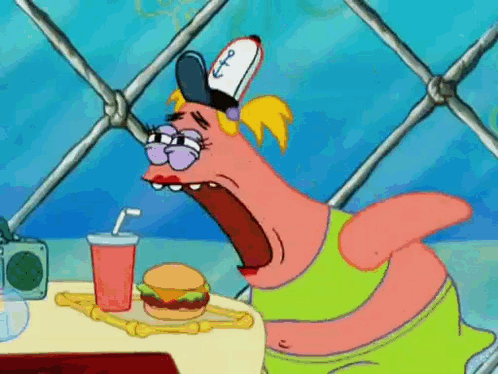 Cartoon Character Sitting At Table With Hamburger And Drink GIF