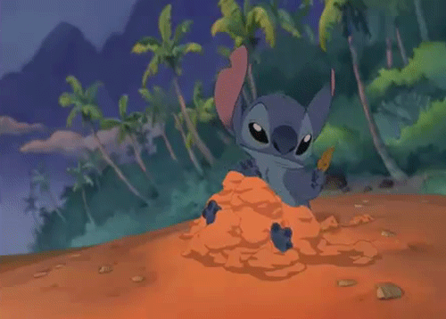 Cartoon Character Sitting in Pile of Sand