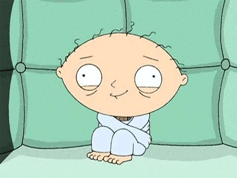 Cartoon Character Sitting on Green Couch