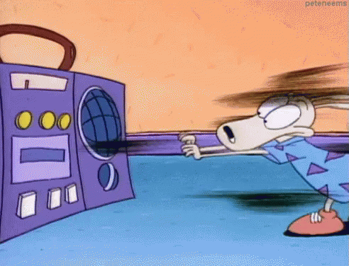 Cartoon Character Standing in Front of Boombox