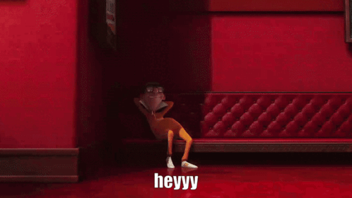 Cartoon Character Standing in Front of Red Wall Saying Heyyy