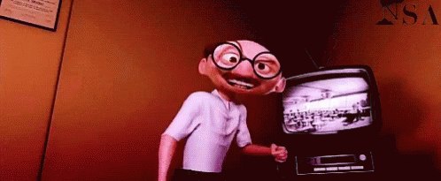 Cartoon Character Standing In Front Of TV GIF