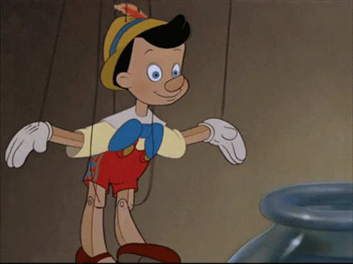 Cartoon Character Standing Next To Blue Vase GIF
