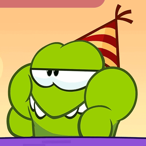 Cartoon Character Wearing Party Hat Sitting at Table