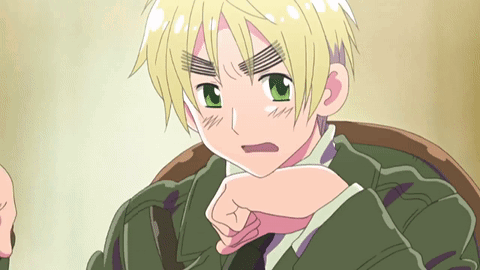 Cartoon Character With Blonde Hair and Green Eyes Sitting in Chair