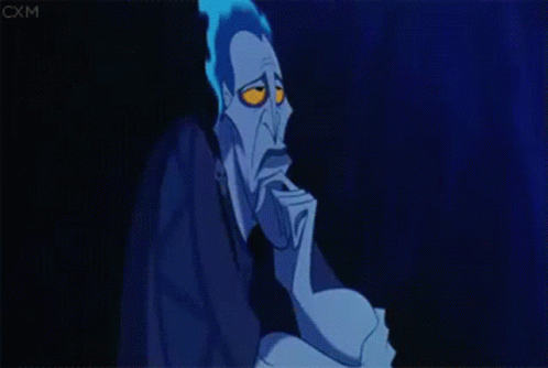 Cartoon Character With Blue Hair and Yellow Eyes