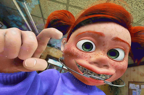 Cartoon Character With Freckles and Braces