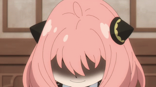 Cartoon Character with Pink Hair and Black Ears Smiling