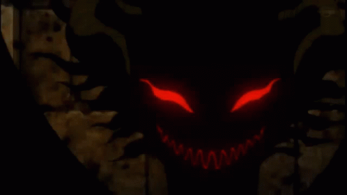 Cartoon Character With Red Eyes And Teeth GIF