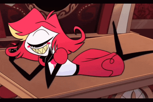 Cartoon Character With Red Hair and Big Teeth Laying on Table