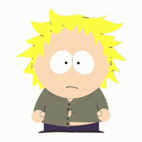 Cartoon Character With Yellow Hair and White Eyes in Green Shirt