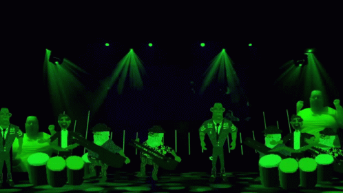 Cartoon Characters Playing Instruments On Stage GIF