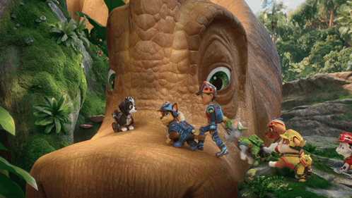 Cartoon Characters Standing Around Large Dinosaur Head GIF