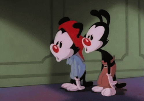 Cartoon Characters Standing Next to Each Other