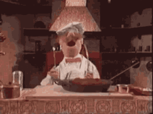 Cartoon Chef Cooking with Frying Pan and Spoon