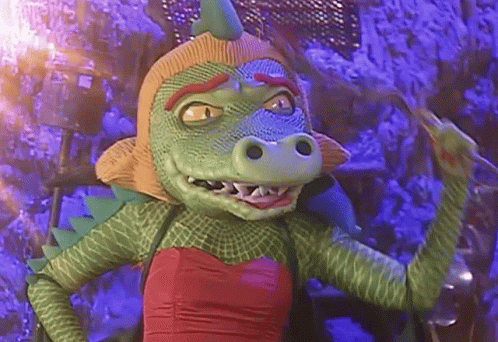 Cartoon Crocodile In Red Dress Waving GIF