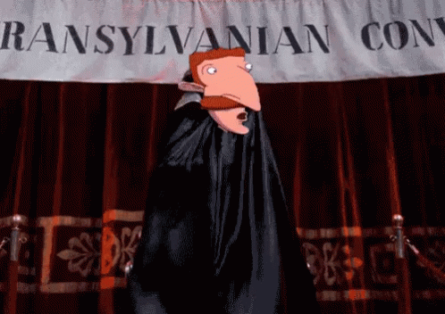 Cartoon Dancing in Front of Transylvania Convention Banner