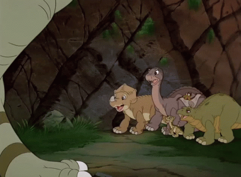 Cartoon Dinosaurs In A Cave GIF