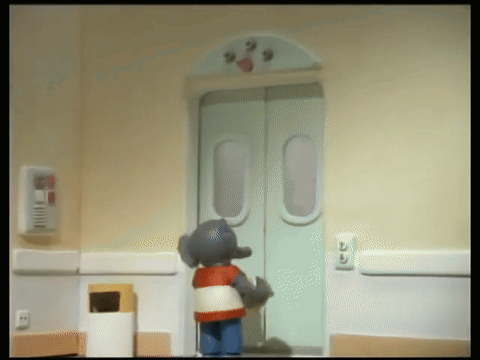 Cartoon Elephant In Front Of Door Number 33 GIF