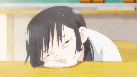 Cartoon Girl Laying on Table Eyes Closed
