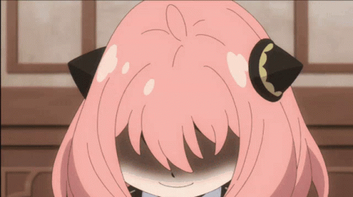 Cartoon Girl with Pink Hair and Black Ears Smiling