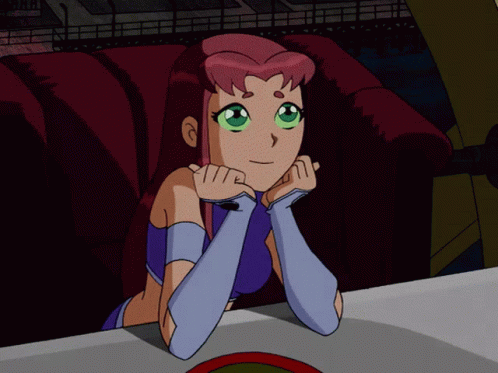 Cartoon Girl With Pink Hair And Green Eyes Sitting On Couch GIF