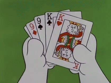 Cartoon Hand Holding Fan of King Queen Spades