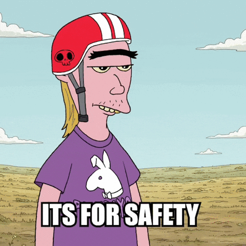 Cartoon in Helmet and Purple Shirt Saying Its For Safety