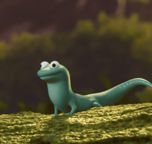 Cartoon Lizard Smiling On Rock GIF
