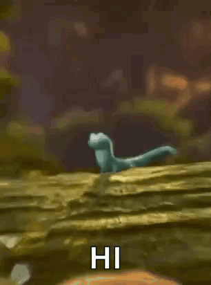 Cartoon Lizard Standing On Rock Waving GIF